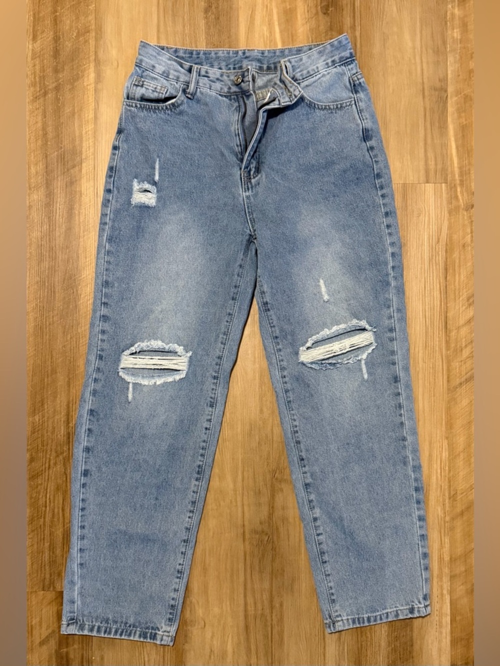 Women’s Light Blue Distressed Denim Jeans